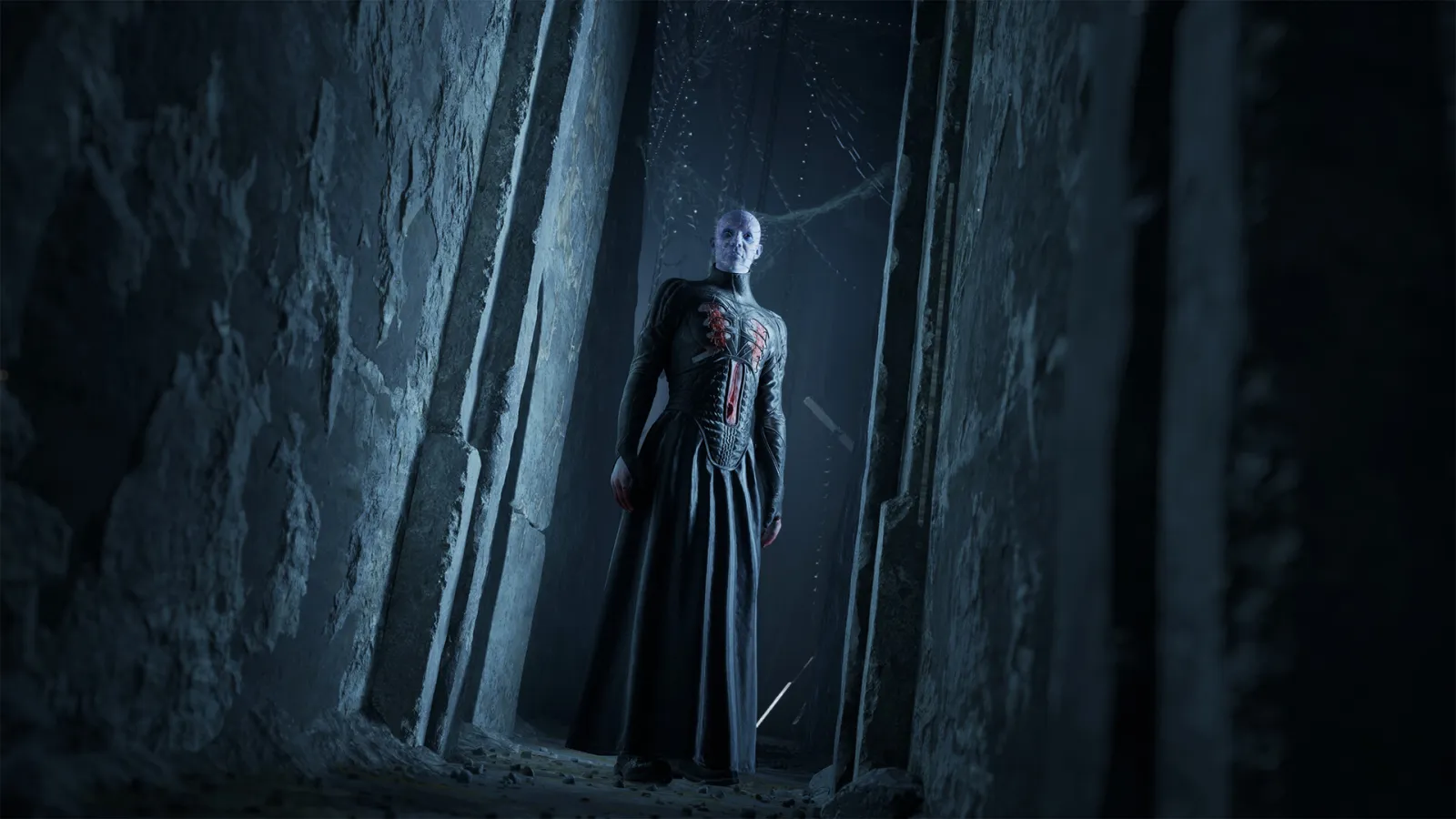 First-person view of Aidan holding the glowing Genesis Configuration puzzle box in a dark stone corridor